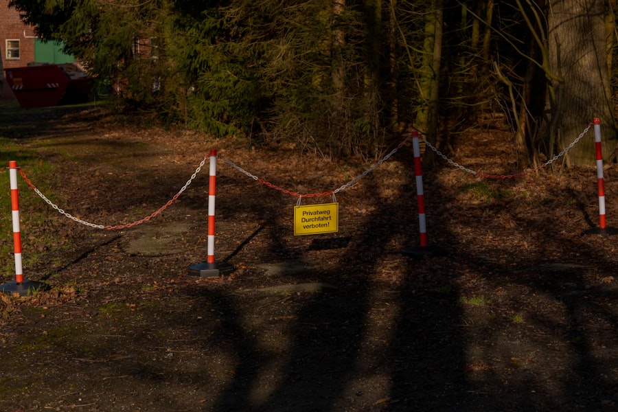 A yellow sign on a barrier tape reads 