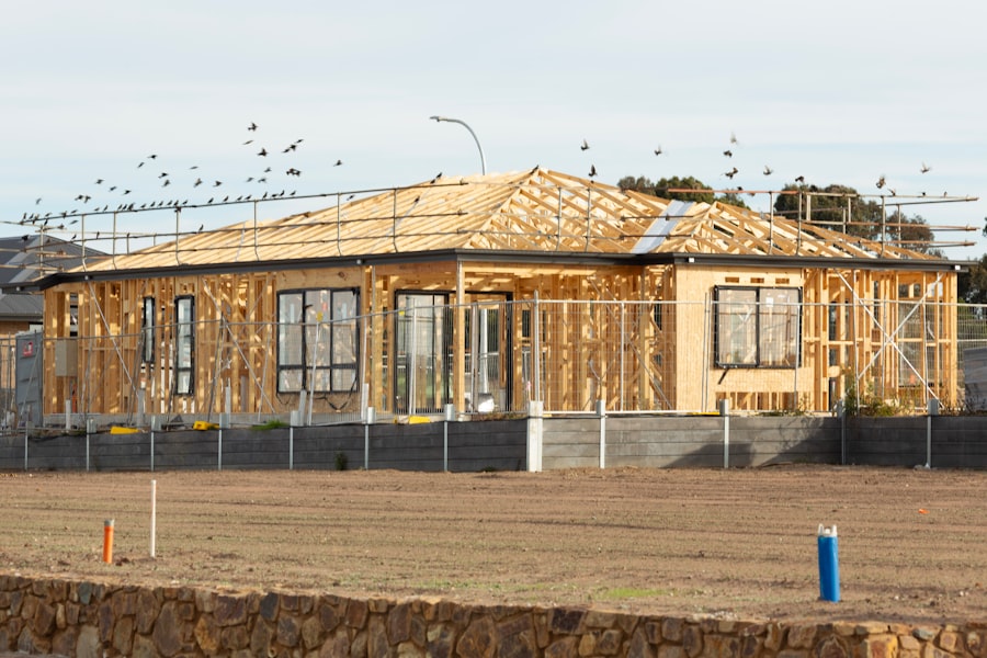 A house frame is under construction.